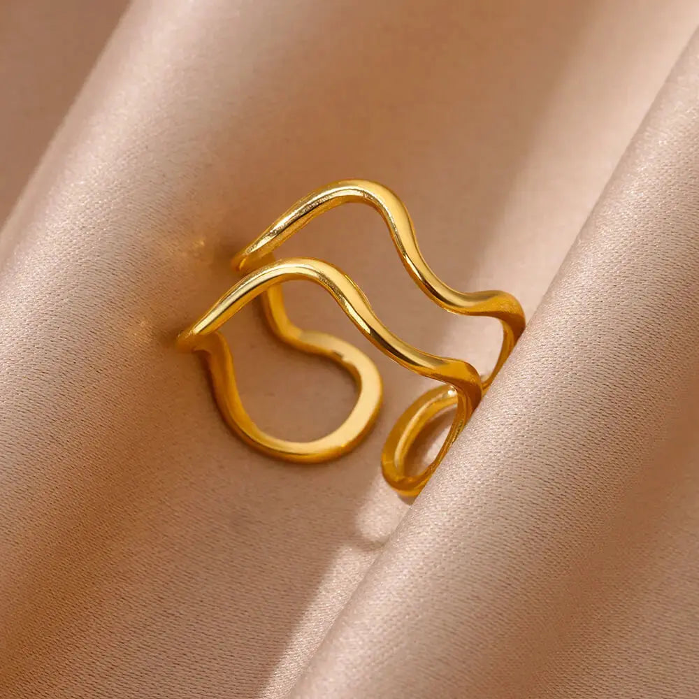 Irregular Geometric Gold Ring – Chunky Adjustable Opening Ring on satin fabric background.