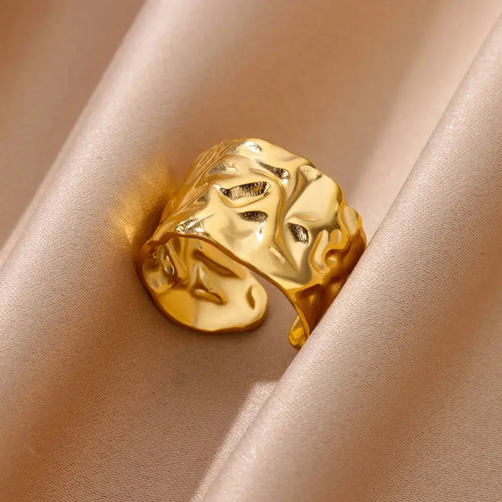 Irregular Geometric Gold Ring – Chunky Adjustable Opening Ring on soft fabric.
